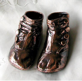 antique bronze baby shoes